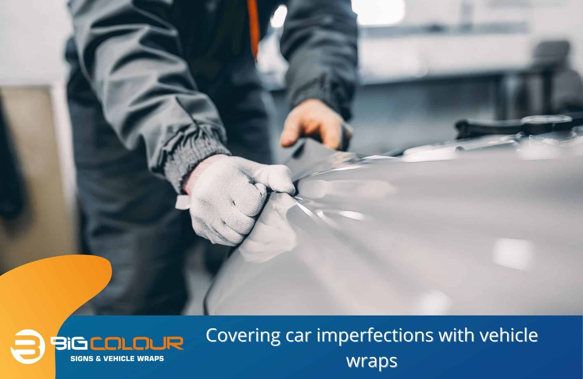 Covering car imperfections with vehicle wraps